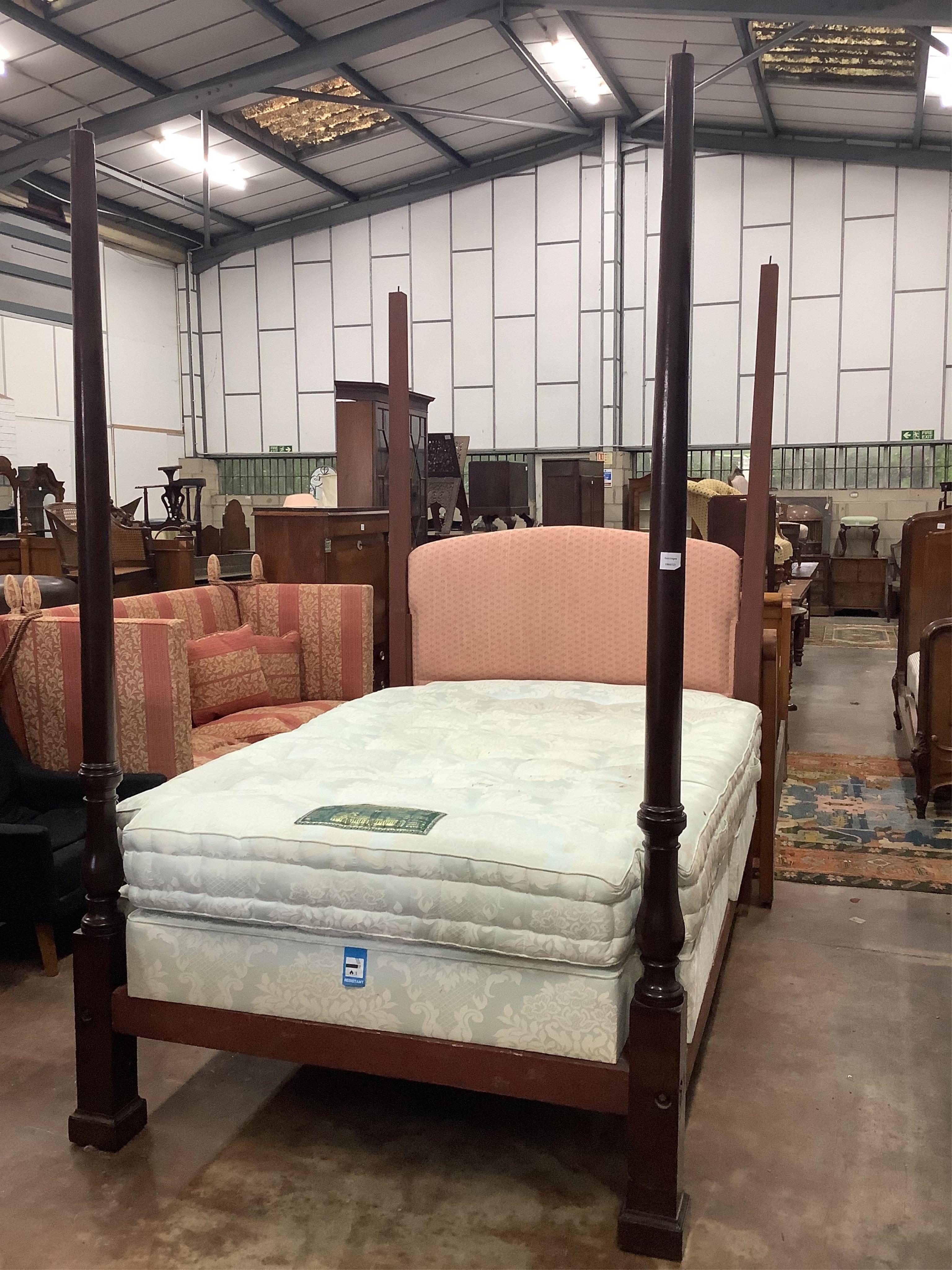 A Victorian mahogany four poster bed frame, lacks canopy, width 140cm, length 198cm, height 224cm. Condition - fair